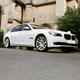 White BMW Wedding Car in front of church