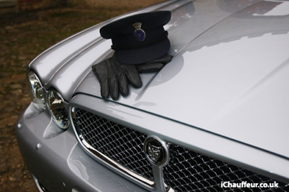 Jaguar wedding car with chauffeur hat and gloves