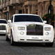Three white Rolls-Royce Phantom Chauffeur Cars