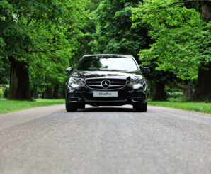 Front of Mercedes E Class chauffeur car in black