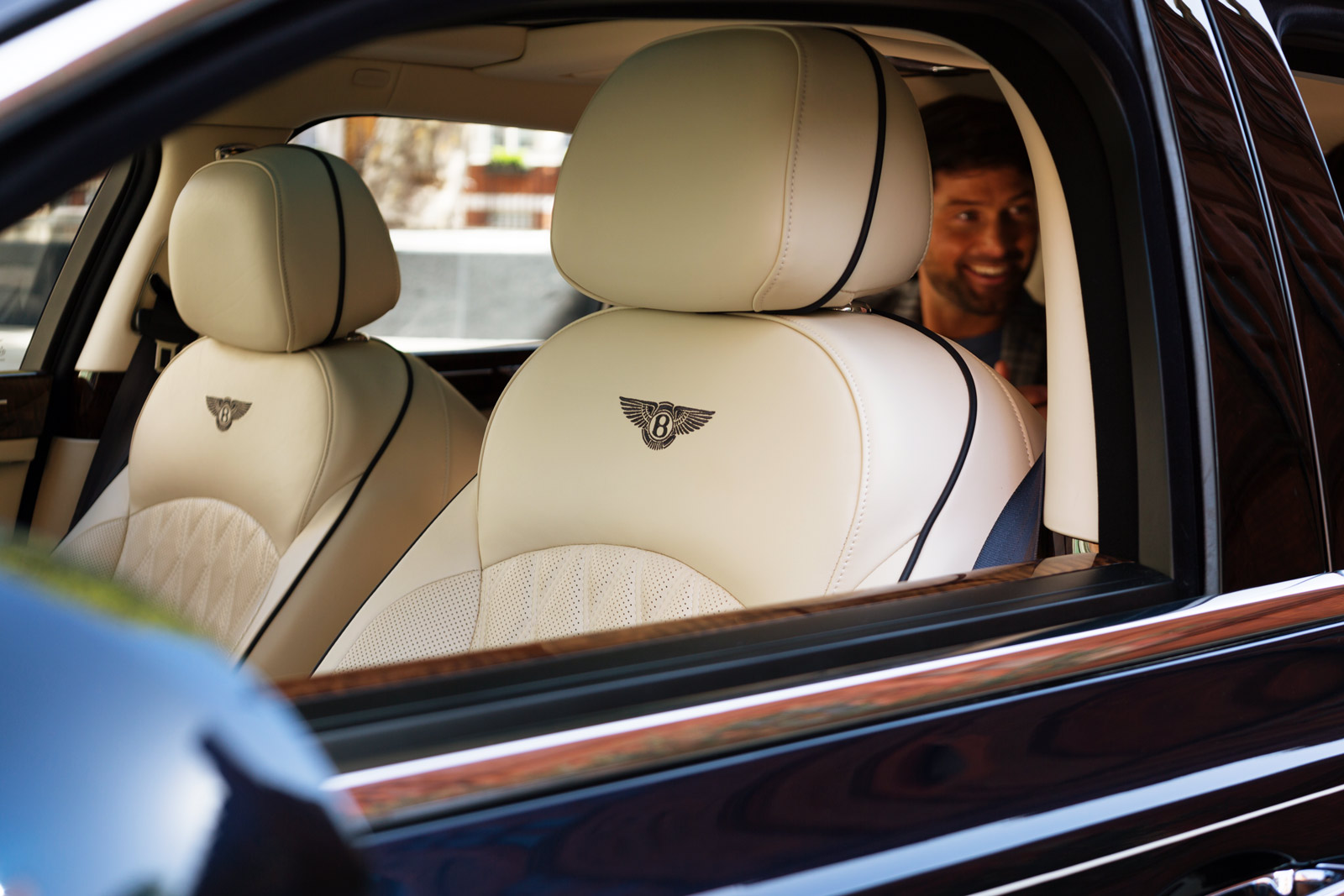 A happy Bentley passenger