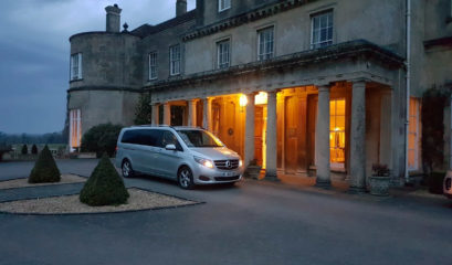 Chauffeur-driven Mercedes-Benz outside Lucknam Park Wiltshire