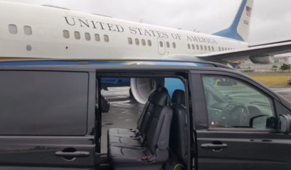 Mercedes V-Class in front of private jet