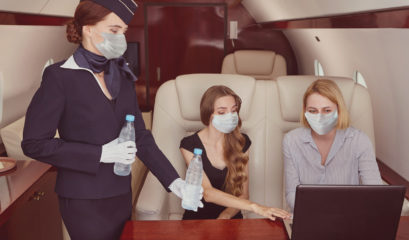 Private jet hostess and passengers