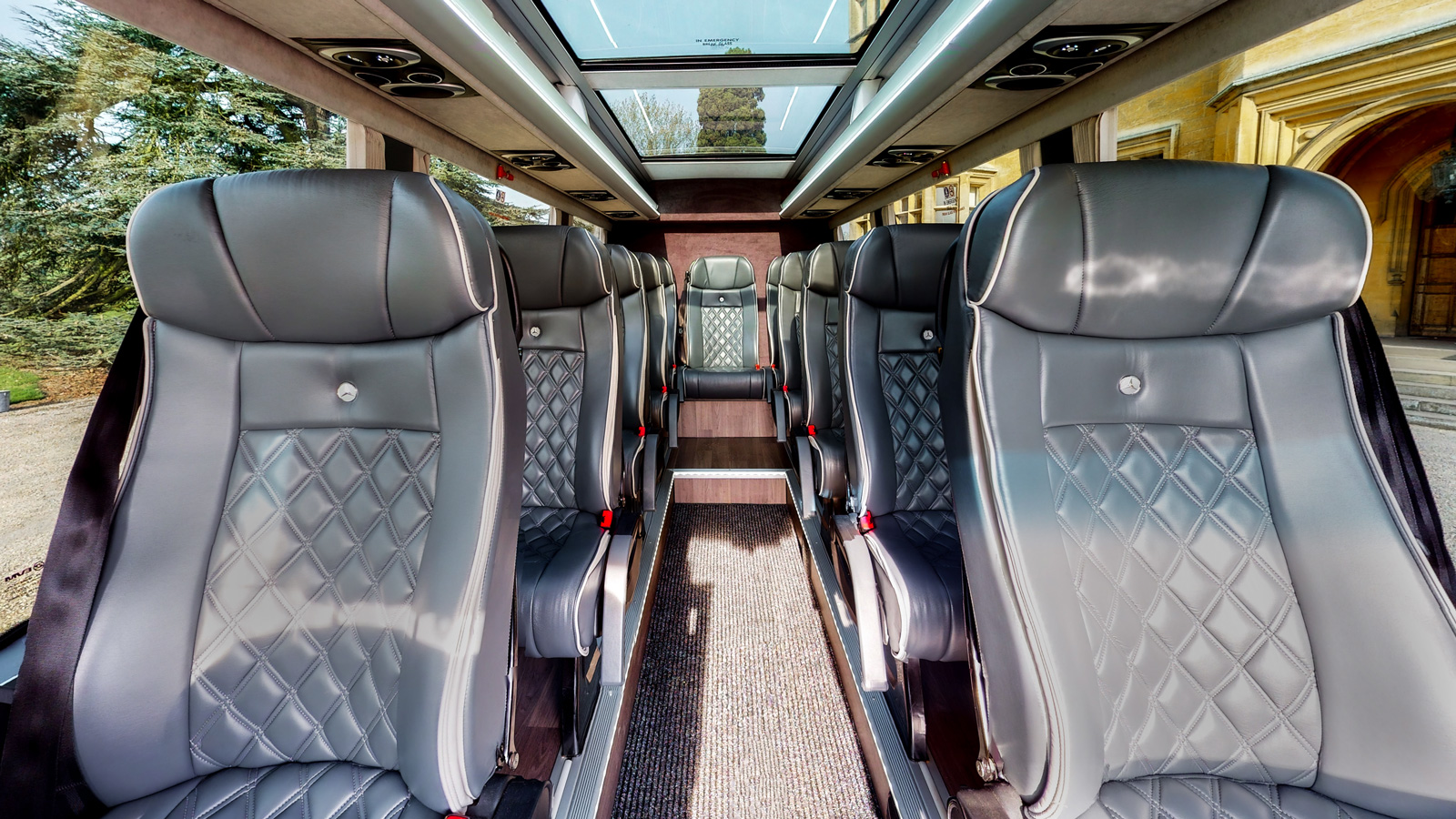 Mercedes Sprinter Luxury 16 seater minibus interior outside a stately home