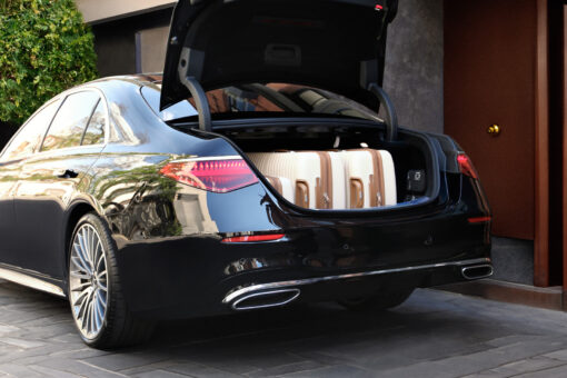 Mercedes S-Class chauffeur car with luggage