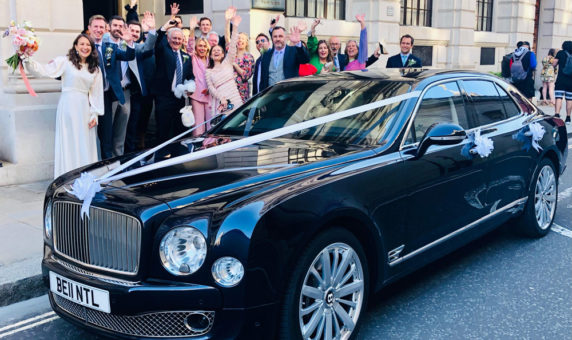 Bentley Mulsanne outside church with wedding party