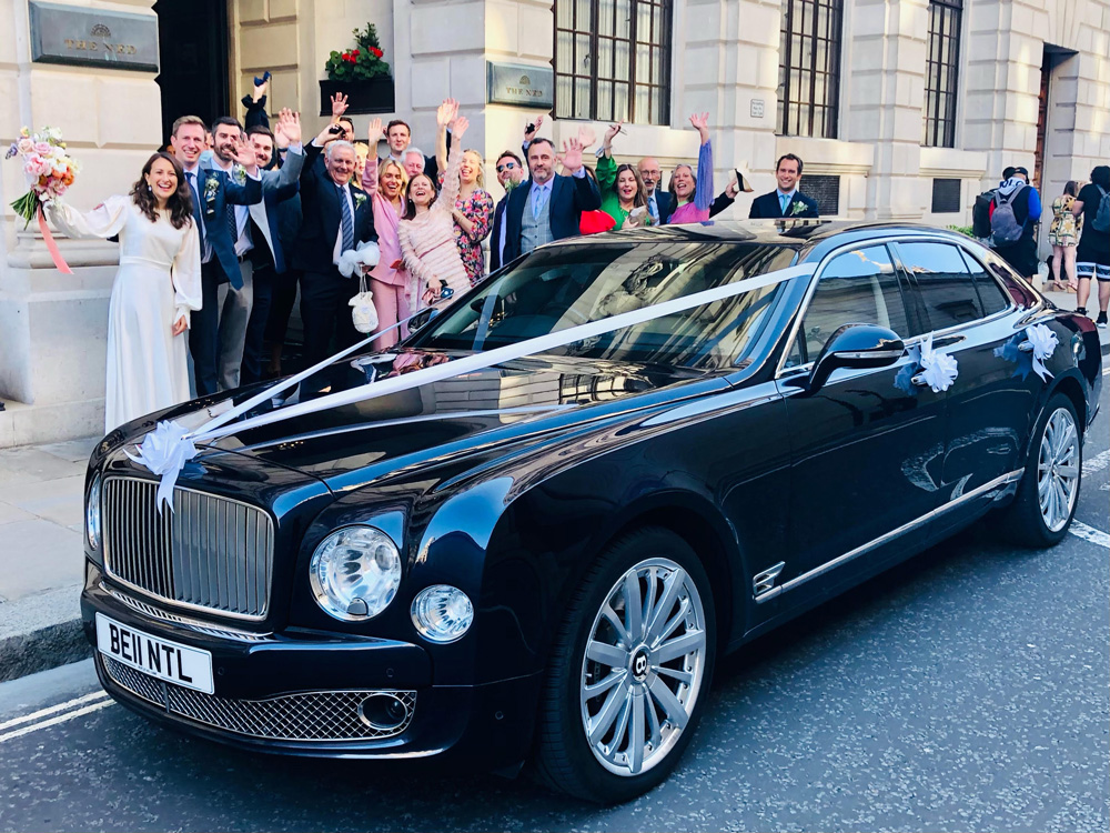Bentley Mulsanne outside church with wedding party