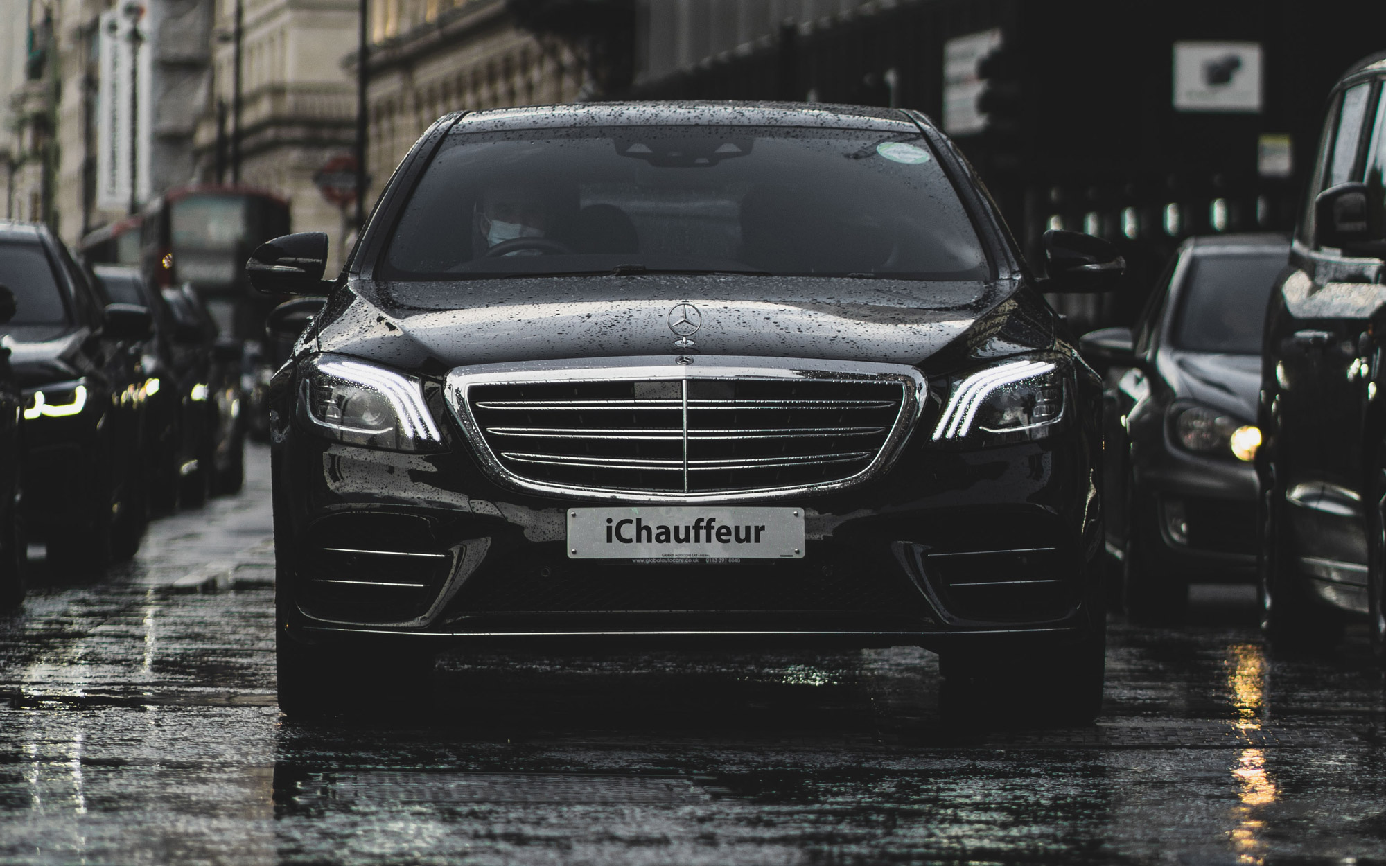 Black Mercedes S-Class with private hire driver in London