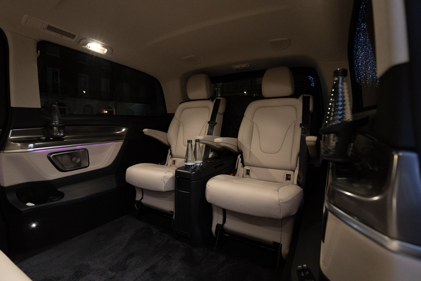 Chauffeur-driven Mercedes V-Class interior at night